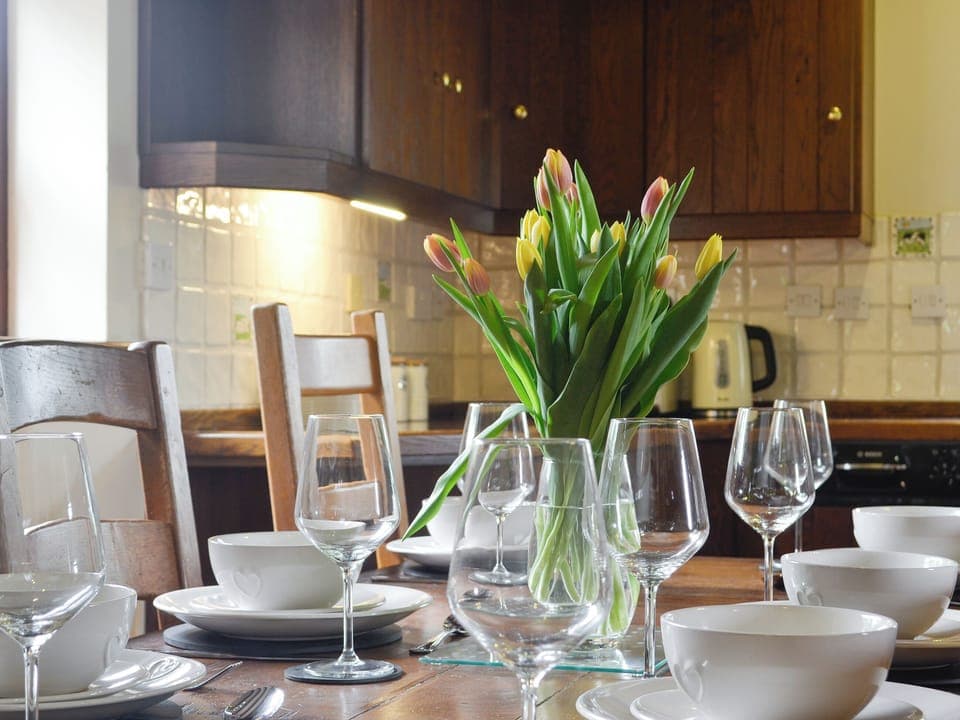 Convenient dining area within kitchen | Green Lane Cottage, Aberhafesp, near Newtown
