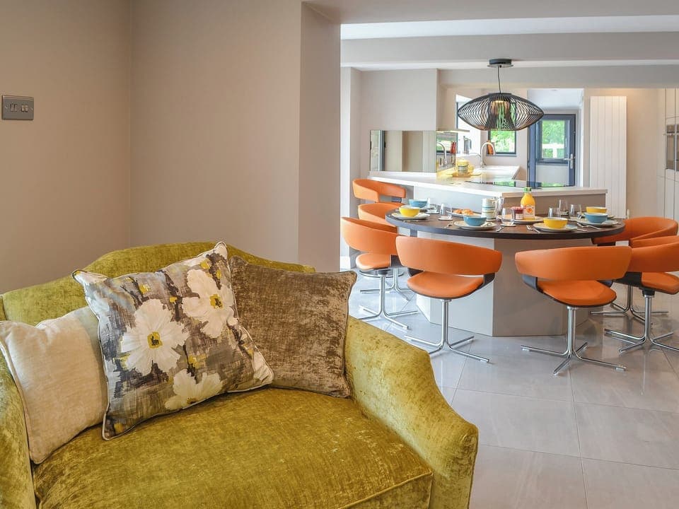 Warm and welcoming living room | Tan Y Fford, Glyngarth, near Beaumaris