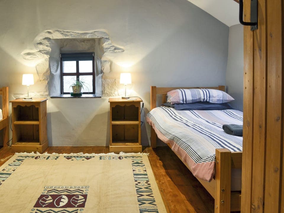 Good-sized twin bedroom | The Stables - Tyddyn Iolyn, near Criccieth