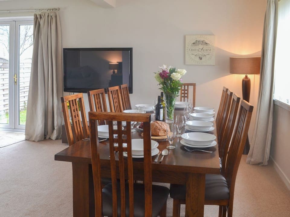 Large dining table seating up to ten guests | Loramore, Aviemore