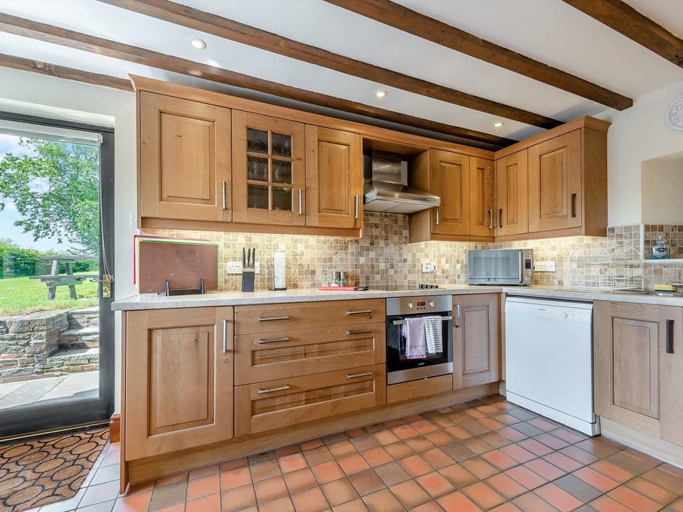 Kitchen | Rhandir Barn - Cennen Cottages at Rhandir Farm, Trapp, near Llandeilo