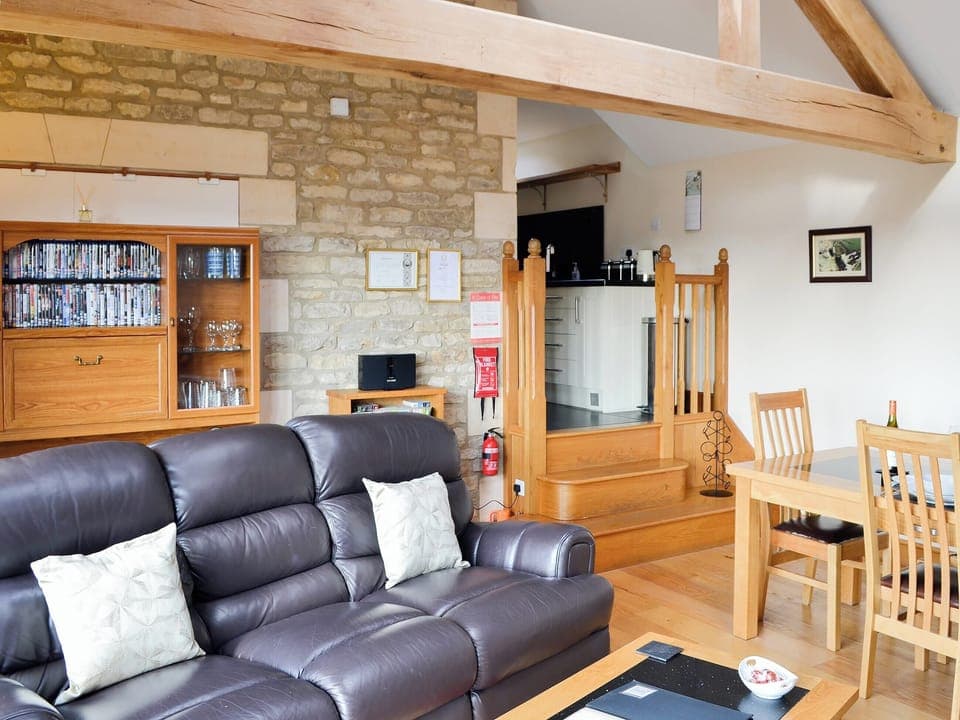 Wonderful living area with exposed beams | Stratton Mill, Cirencester