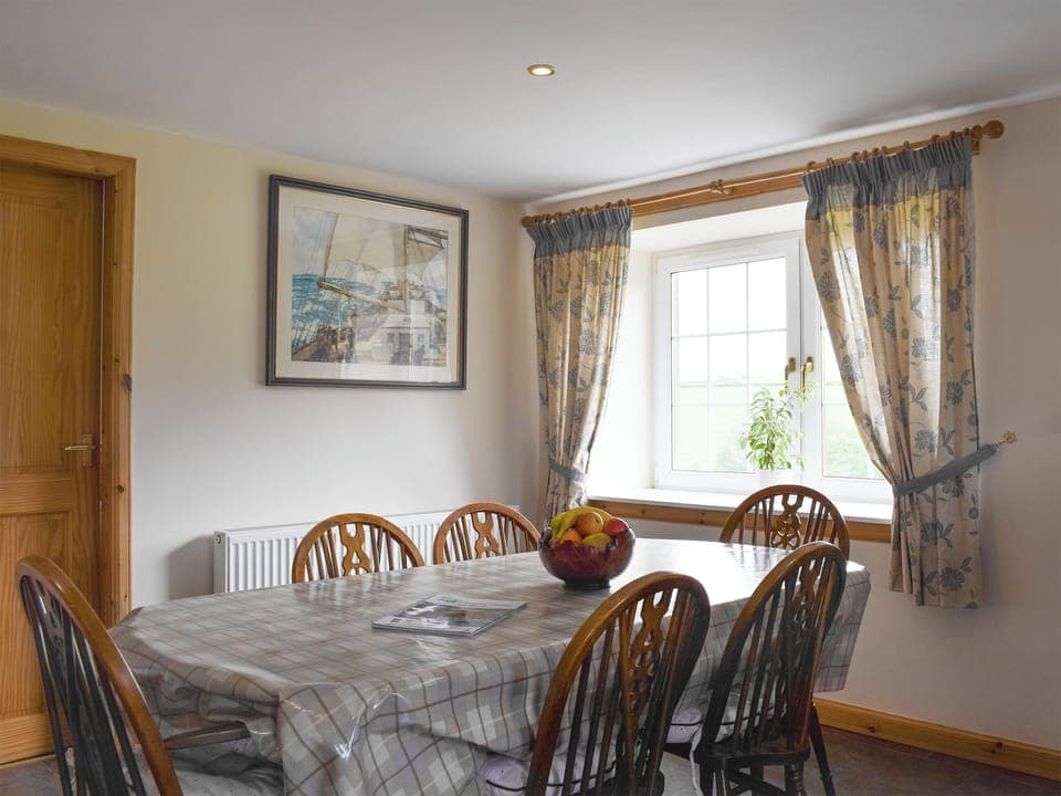 Convenient dining area within kitchen and dining room | The Stables - Loch Lomond Farm Cottages, Balfron Station, near Stirling