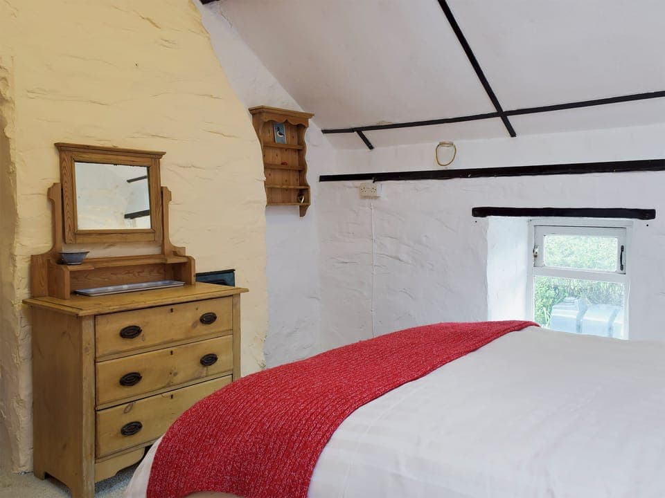 Comfortable bedroom with kingsize bed and beams | Y Teras, Rosebush, near Narberth