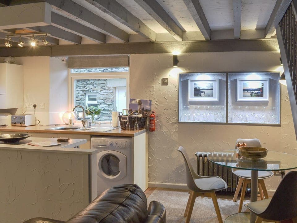 Open plan living space with beamed cieling | Grange End Stables - Grange End Cottages, Grasmere
