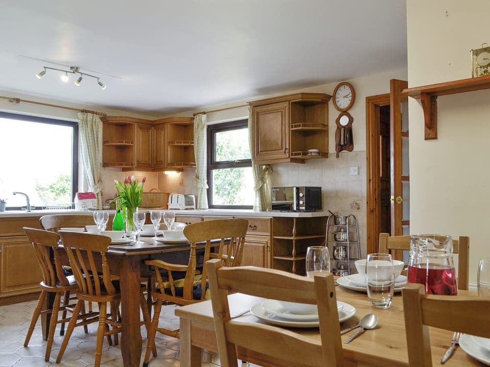 Twin dining areas within kitchen | Three Views Bungalow, Talgarth, near Hay-on-Wye