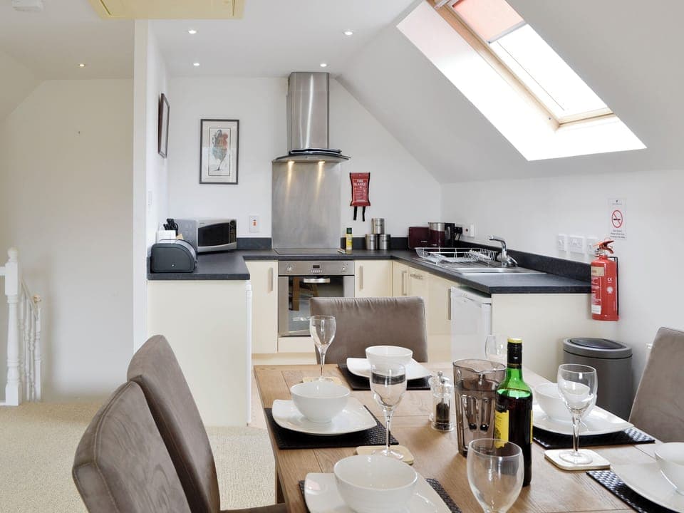 Dining area between kitchen and living area | No 32 - Queens Court, Inchmarlo, near Banchory