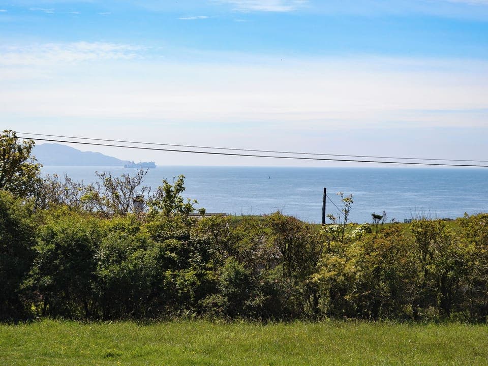 Holyhead mountain view, with ferries to Ireland | Seafield, Church Bay, Anglesey