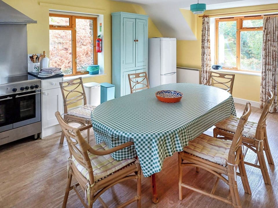 Kitchen dinner | Erw Goed Old Barn, Arthog, near Dolgellau