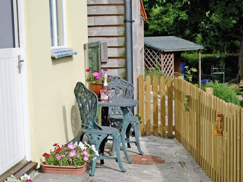 Patio with furniture | Wheelwright Cottage, Halwill