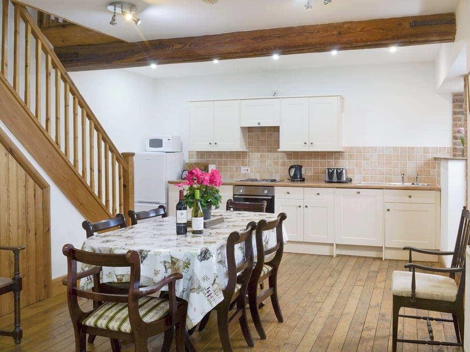 Well-equipped fitted kitchen with convenient dining area | The Granary Barn - Ash Farm Barns, North Willingham, near Market Rasen
