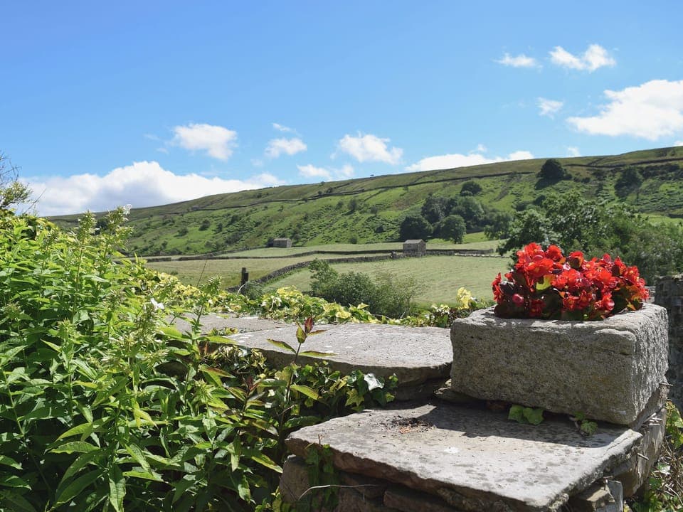 View of the surround area from the garden | Harriet&rsquo;s Cottage - Muker Cottages, Muker near Reeth