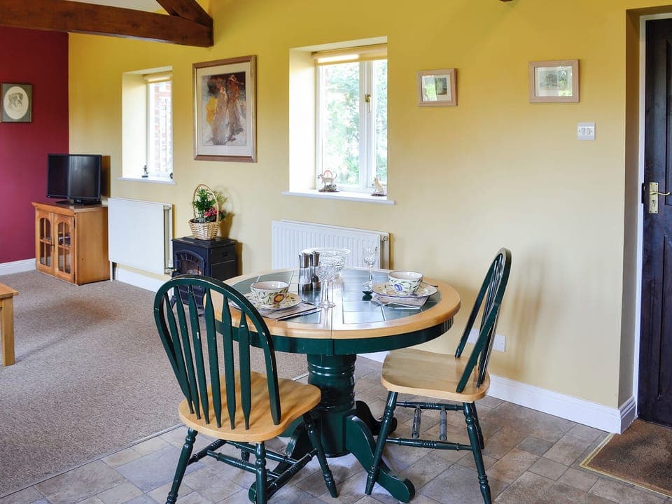 Compact farmhouse kitchen-style dining area | Barleycorn, Holnest, near Sherborne