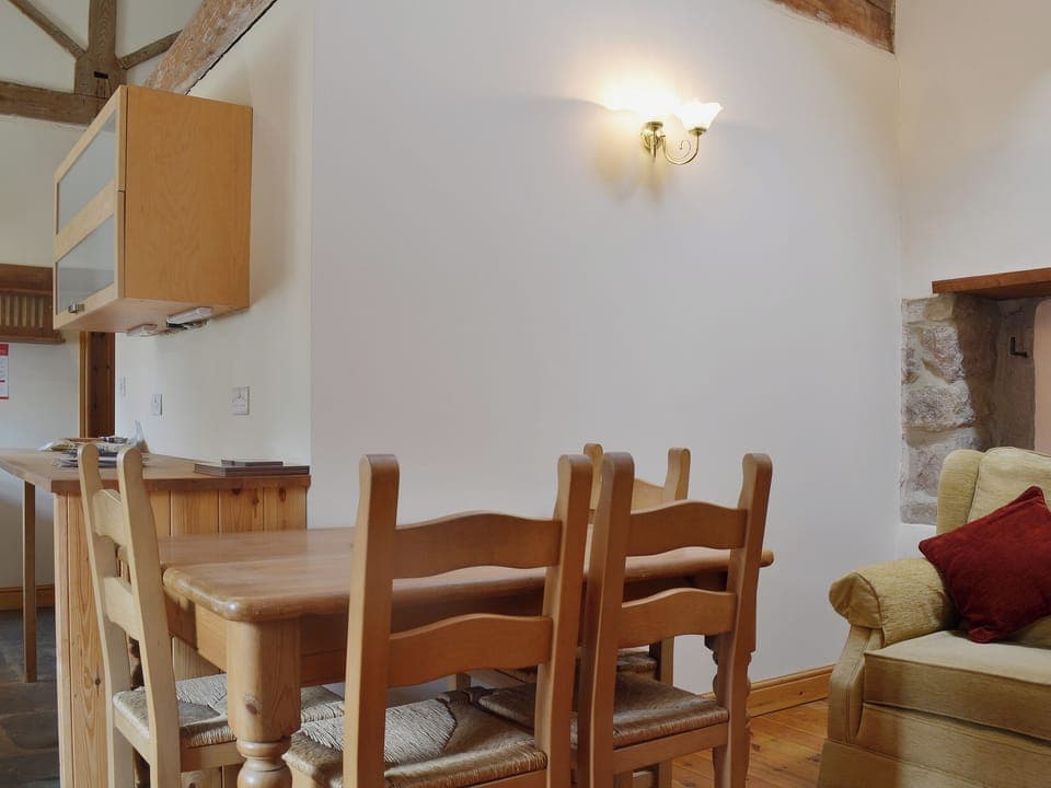 Superb dining area with exposed beams and high ceilings | Barn Owl Cottage - Willersley Farm, Cromford, near Matlock