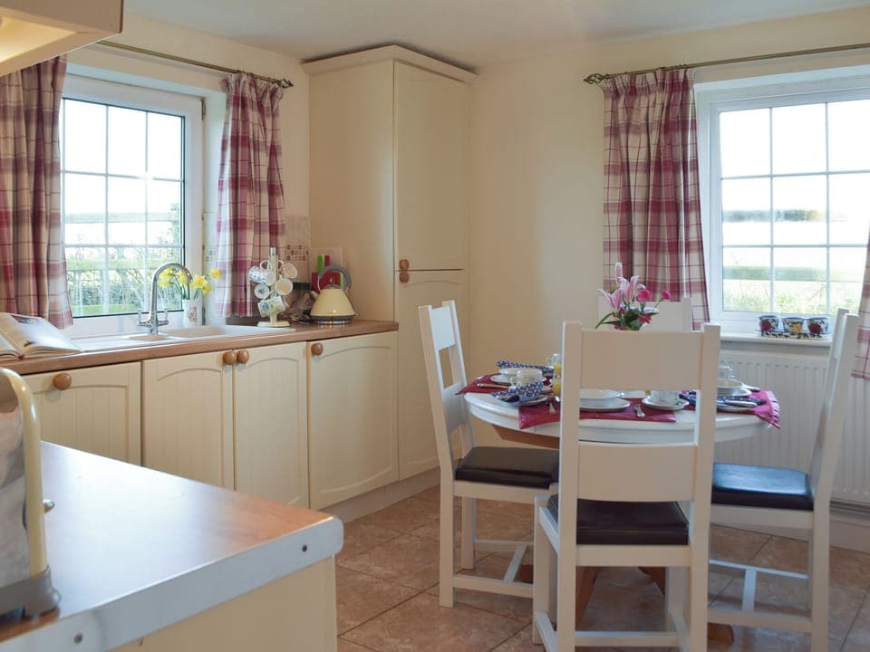 Kitchen with dining area | Carthouse Cottage, Cosheston near Pembroke
