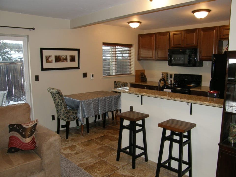 Kitchen has heated floor! Granite counters, new cabinetry, new appliances (range, micro, dishwasher), new sink....Heck, new everything! 