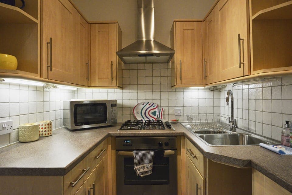 Kitchen with oven and microwave 