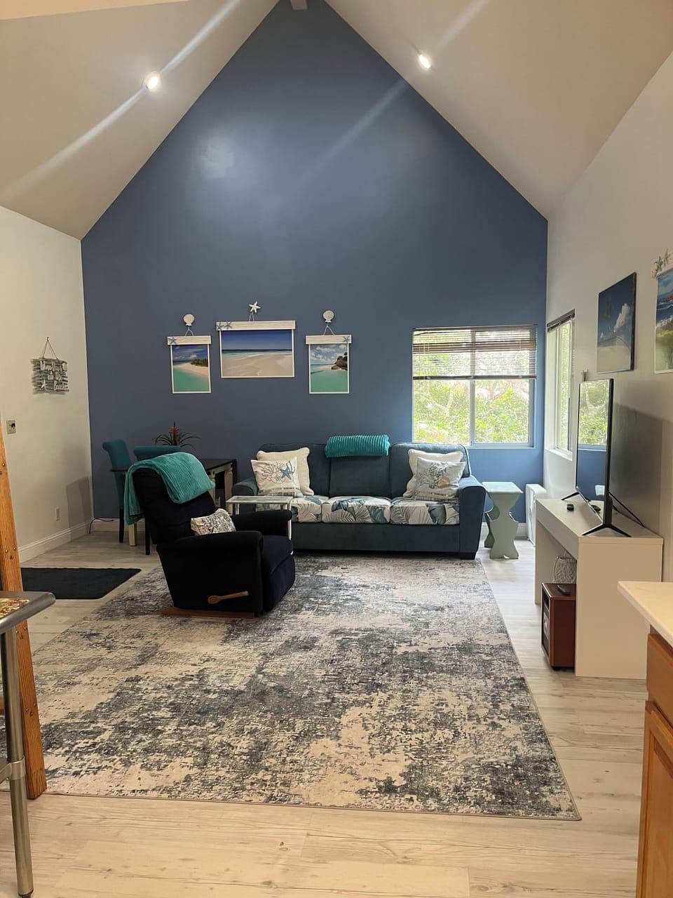 Living area:  sleeper sofa, recliner & dining area