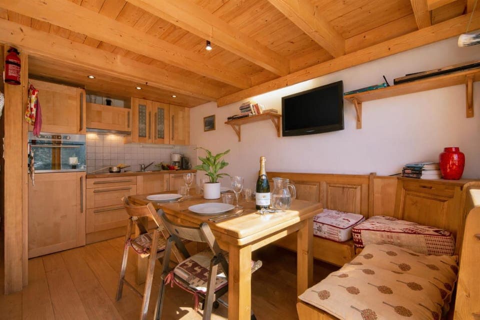 Dining area & kitchen with HDTV