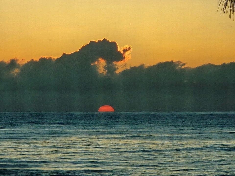 Watch the ball of Orange rise out of the ocean. Once in a lifetime expierence