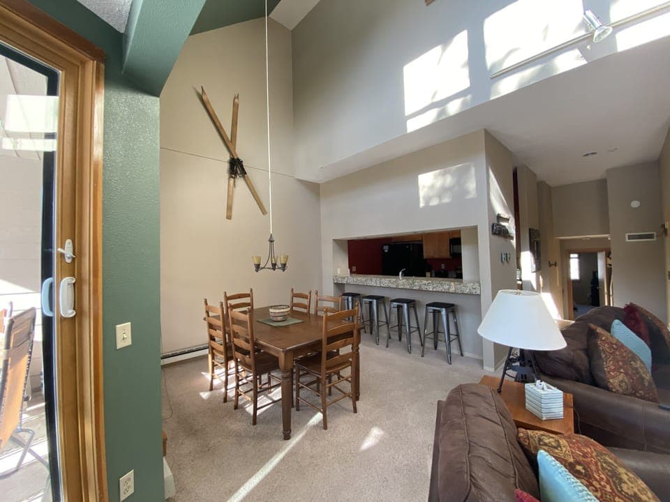 Dining area with bar stools at the counter for extra space.