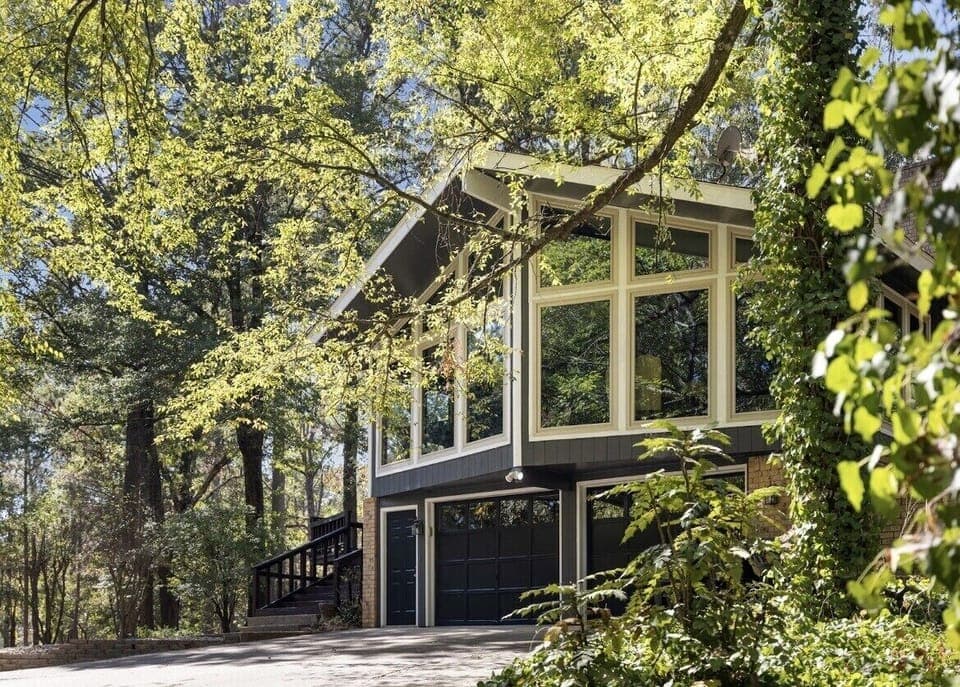 Hilltop Lodge / Front Entry Way / Concrete Parking Pad.