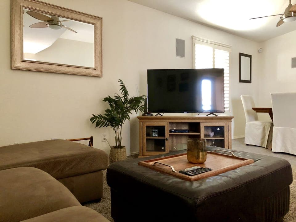 Living room, 60” TV with Roku (Hulu, Netflix, Amazon Prime, AT&T connect, etc) 