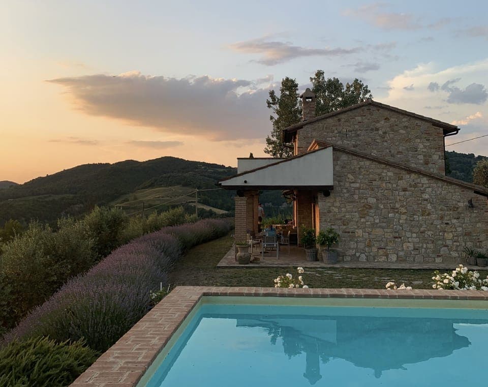 The beautiful stone house seen from the pool area