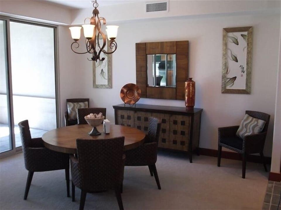 Dining room right off kitchen and access to lanai.