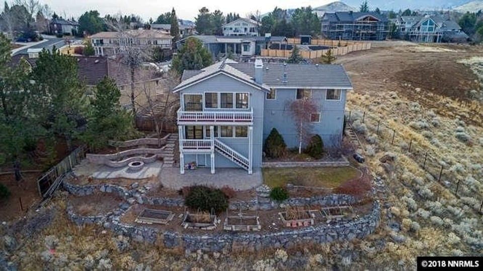 OUR SPLIT LEVEL HOME HAS SPECTACULAR VIEWS OF THE CITY AND THE SIERRAS