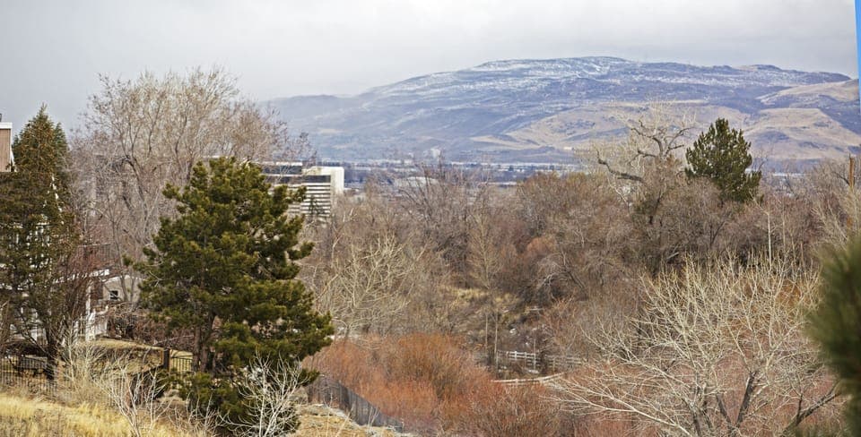 SPECTACULAR VIEW OF THE CITY AND THE SIERRAS FROM THE REAR BALCONY