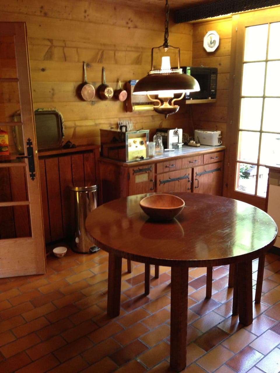 Beautiful fully equipped kitchen with French doors opening onto the rear terrace