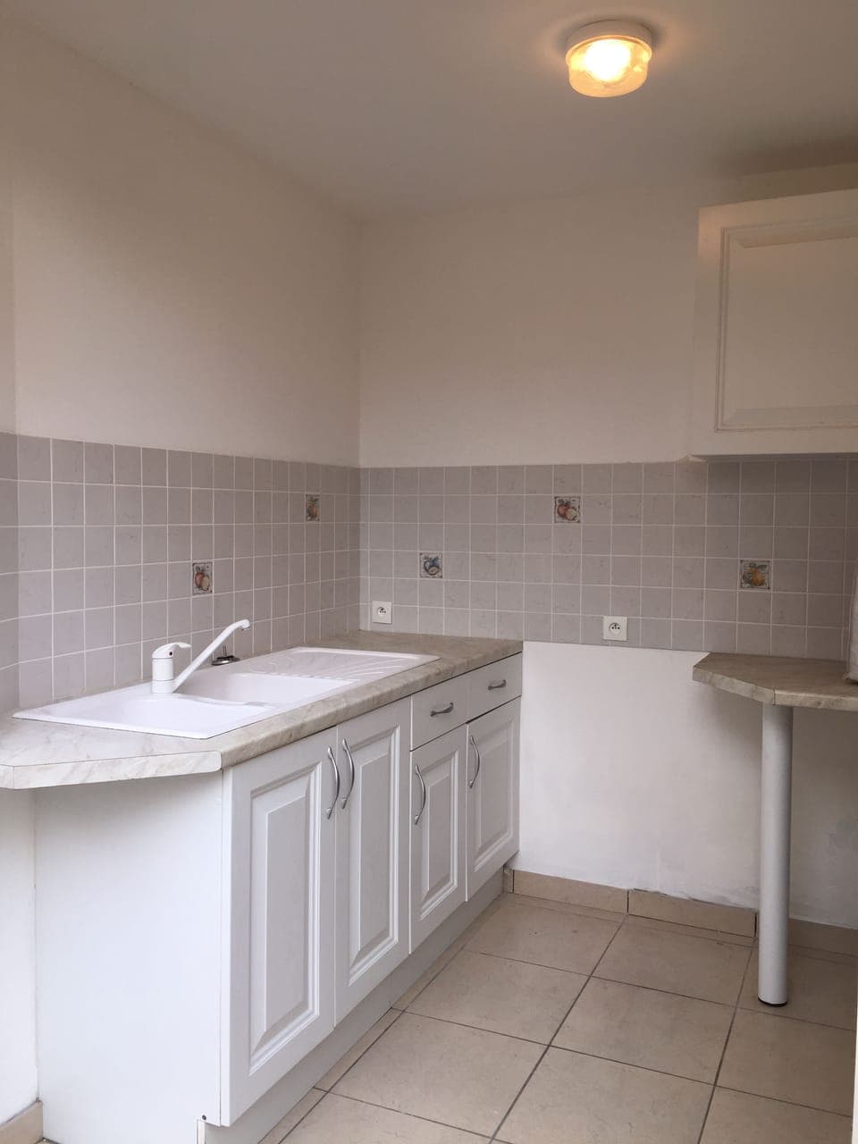 The outdoor kitchen adjacent to the courtyard