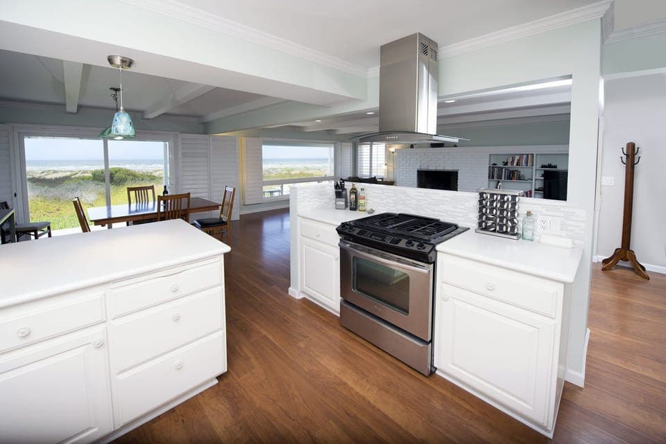 The kitchen includes high end appliances and a gas stove.