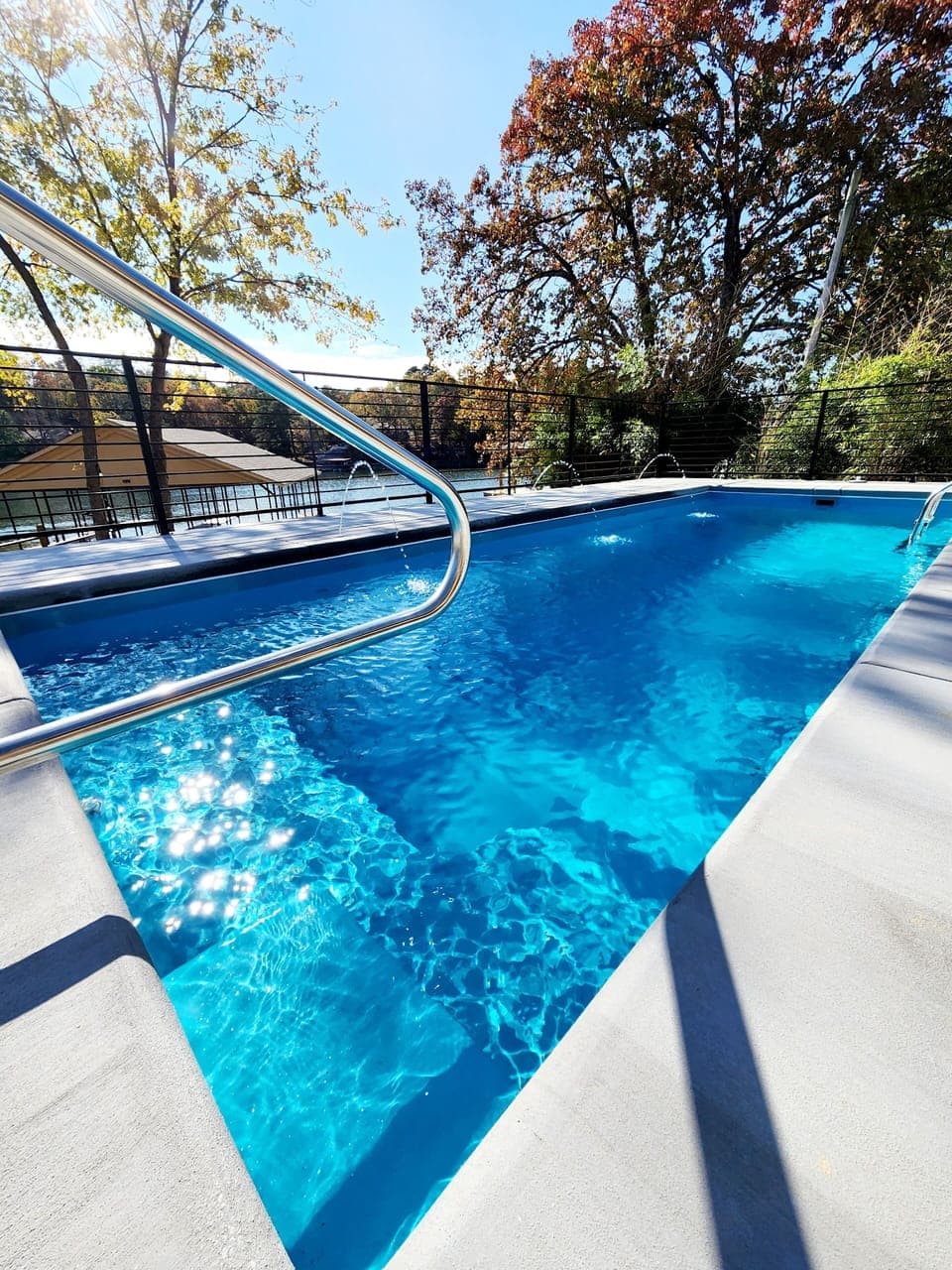 Perfect year around pool lake side with amazing views! 