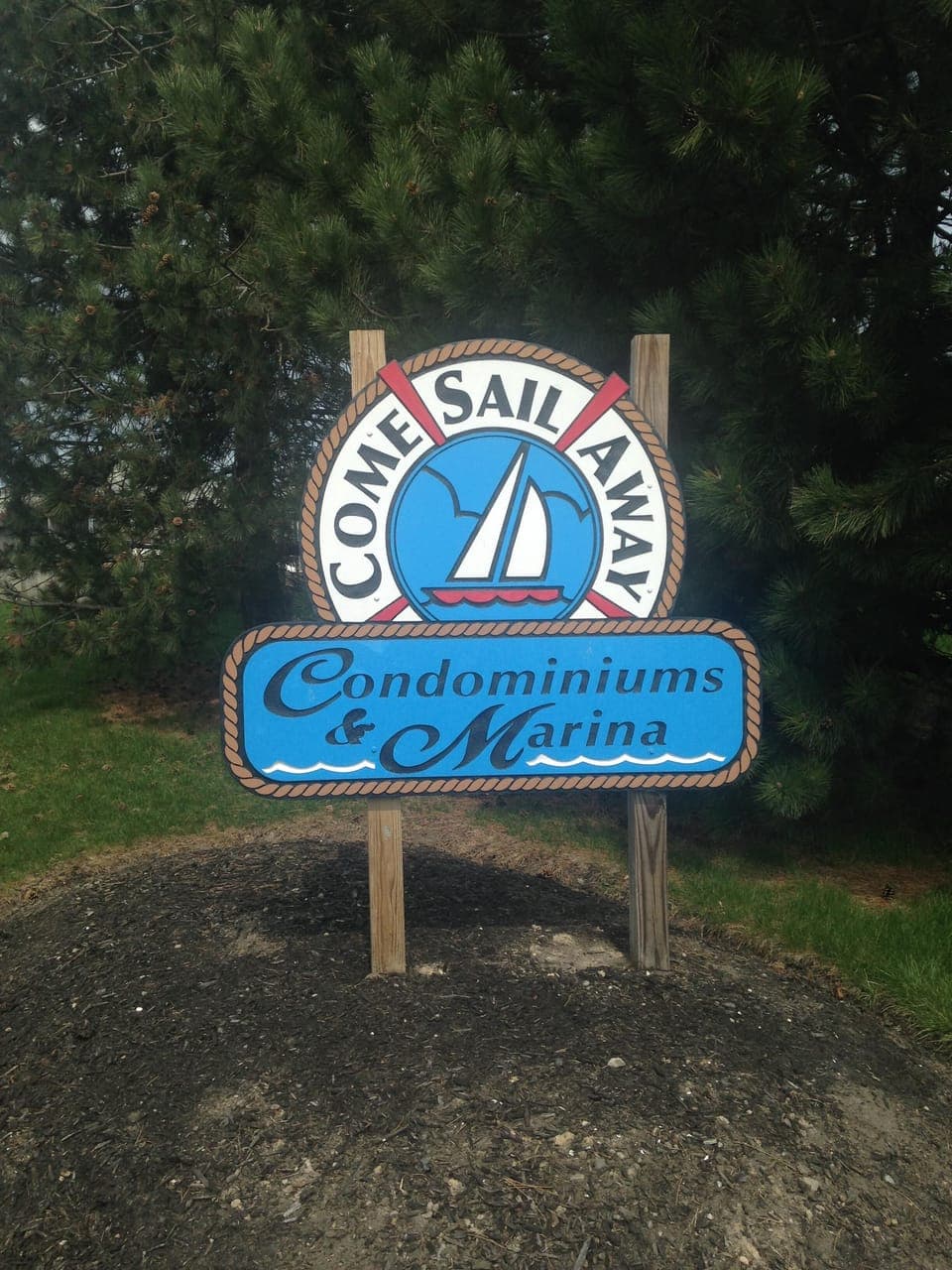 Condo entrance sign by the pool