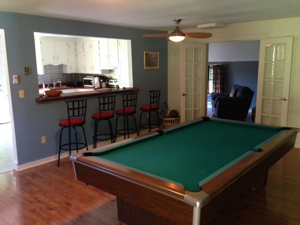 Game Room, bar opens to kitchen (seating for 6 at bar)