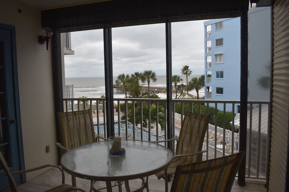 Balcony overlooking pool and gulf