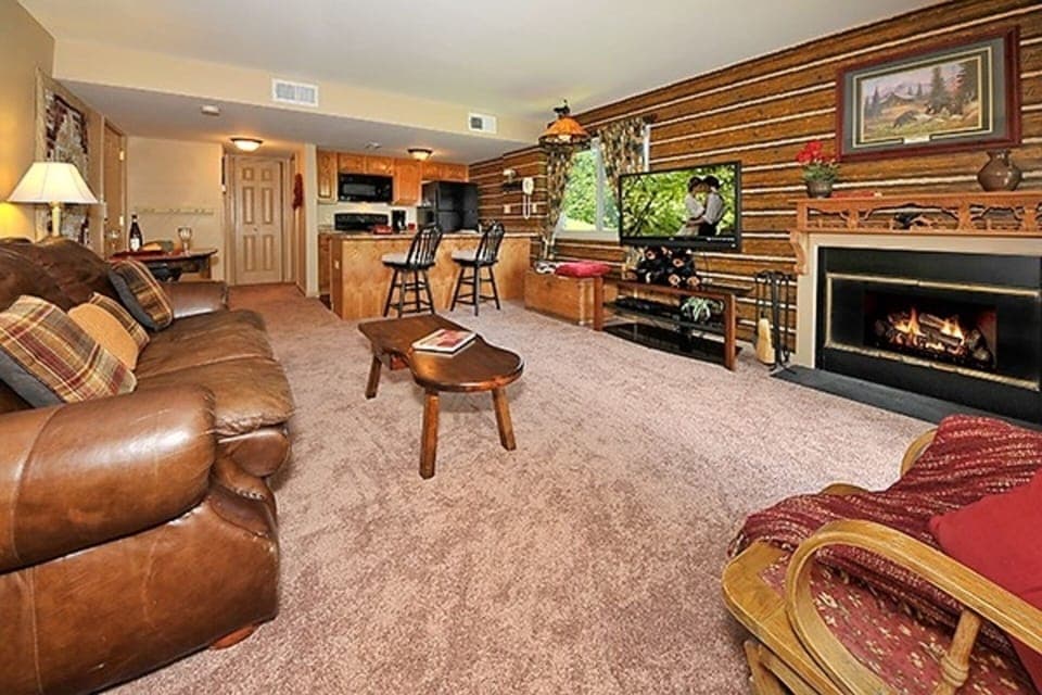 Cozy living area with electric fireplace and magnificent views 