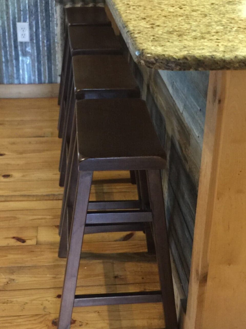 Rustic Retreat - Bar stools for easy meals.