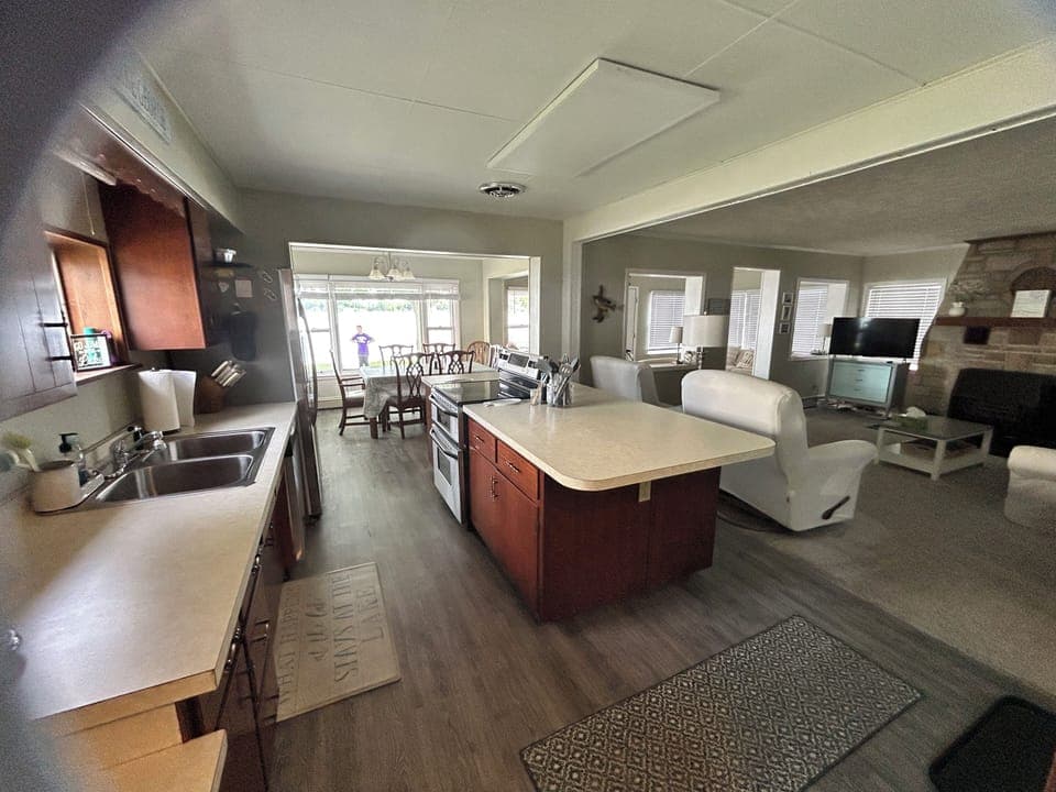 Open concept kitchen with large wrap around countertop