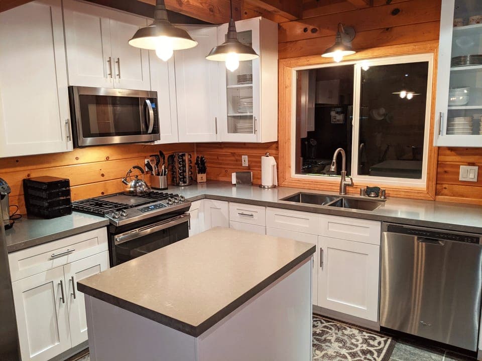 Kitchen stove, microwave and refrigerator.  Keurig coffee maker, toaster, etc.