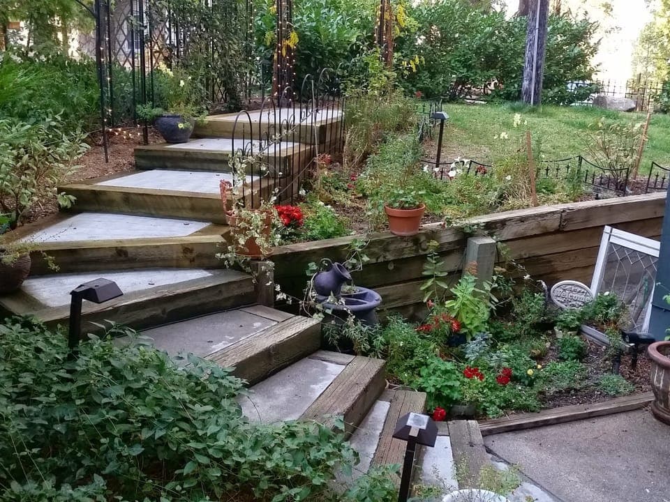 Back yard steps, garden and fountain. May through Nov. Snow covered in Winter.