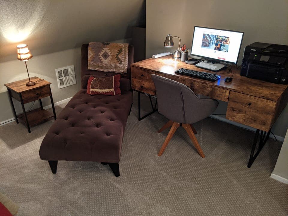 Lounge or work in guest bedroom office area with desk, Chromebook and printer