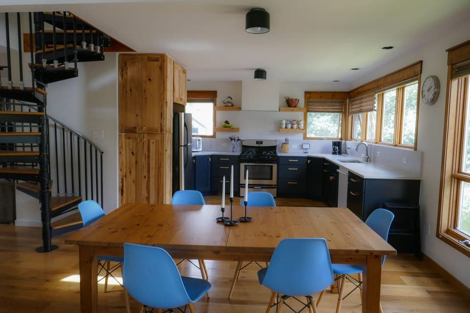 Kitchen with room for multiple cooks. Table expands to fit 12.
