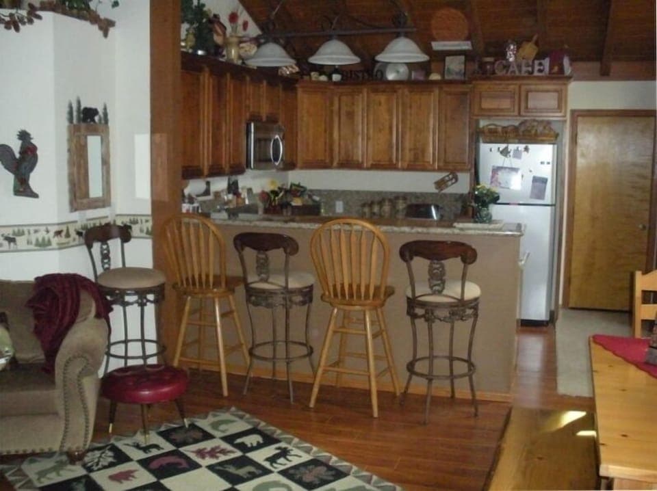 Dining room seats 8
 at table, kitchen bar seats 5!