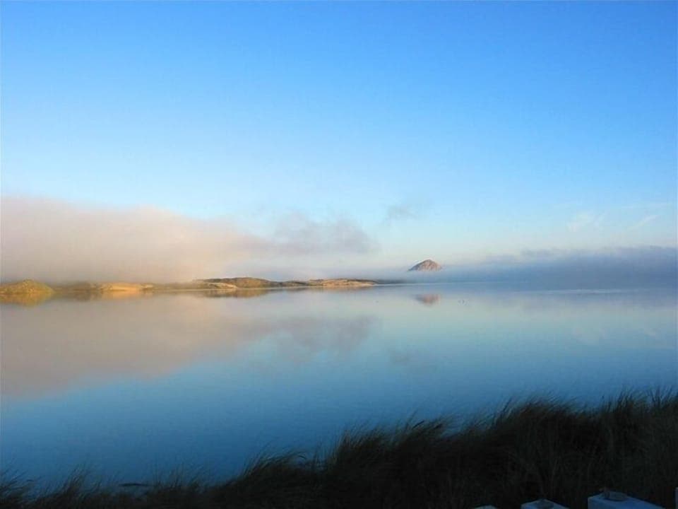 Dramatic unobstructed water and mountain views from the Cottage