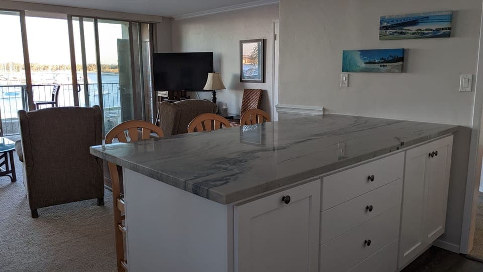 Kitchen peninsula looks out on the bay