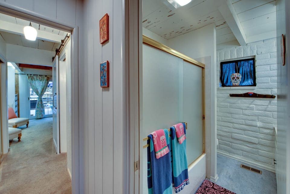 Guest bathroom with shower tub combo.
