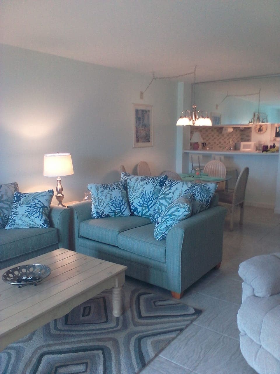 View through living room to dining area and kitchen.